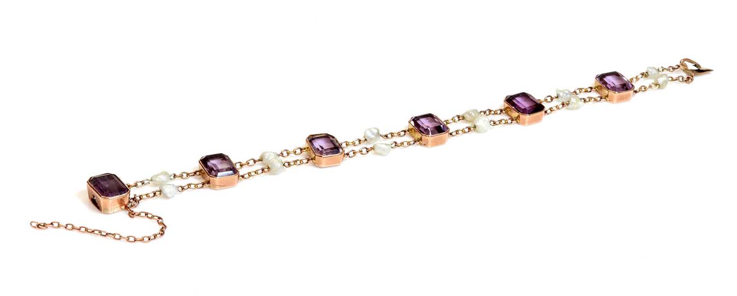 Lot 70 - A rose gold amethyst and pearl bracelet, c.1910