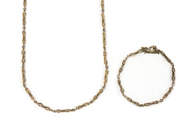 Lot 1122 - A 9ct gold bracelet and necklace suite