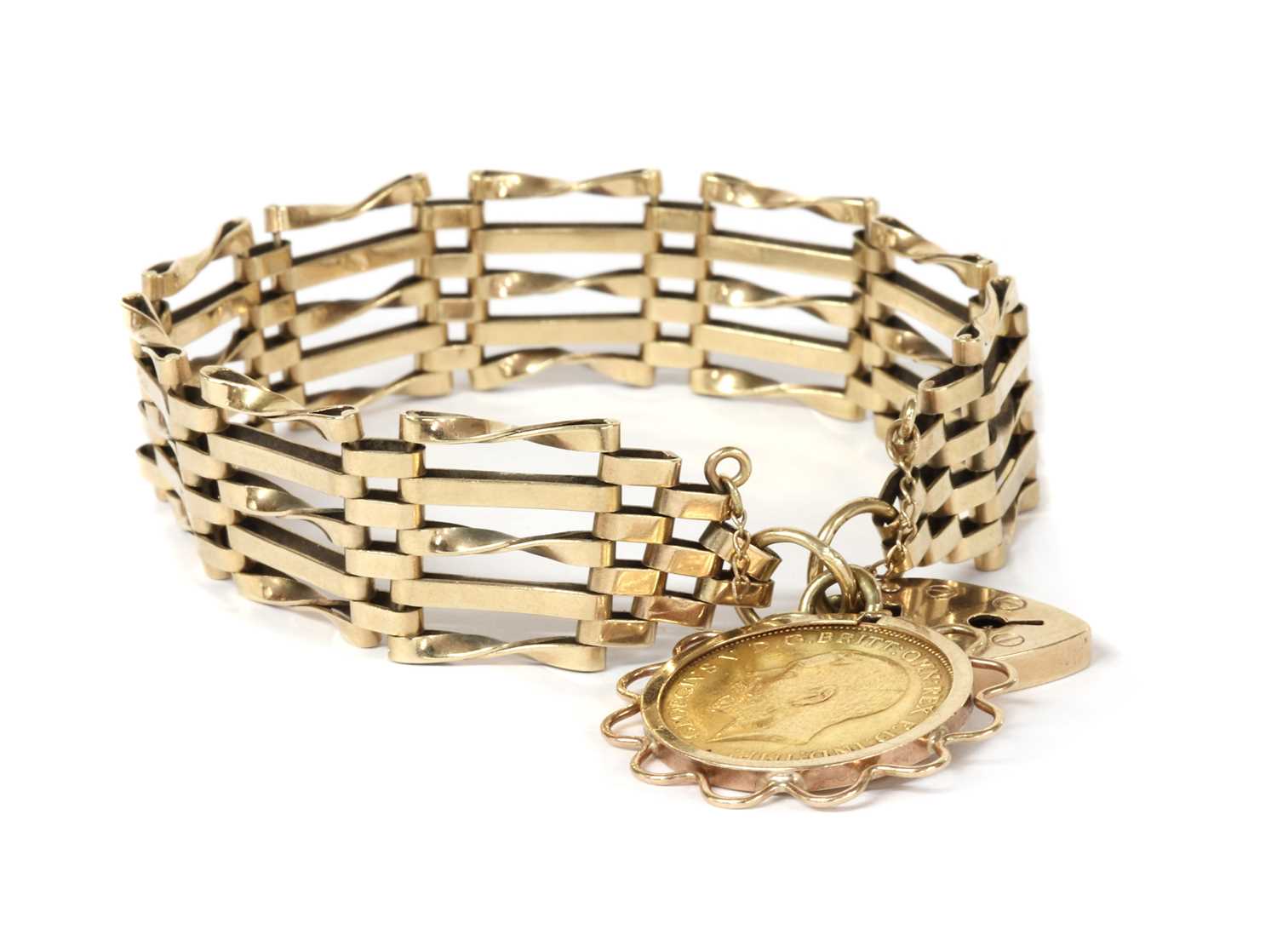 Lot 1113 - A 9ct gold gate bracelet