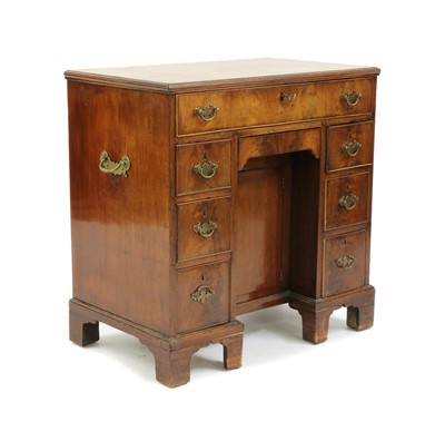 Lot 223 - A Georgian mahogany kneehole desk