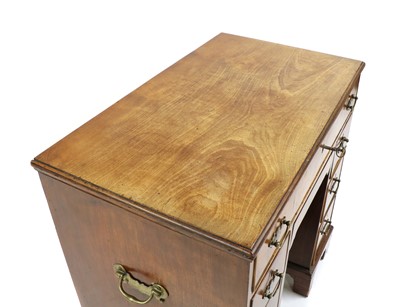 Lot 223 - A Georgian mahogany kneehole desk