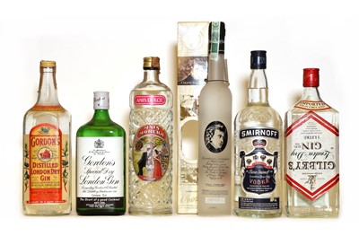 Lot 438 - Assorted Spirits: Gilbeys, London Dry Gin, 1980s bottling and five various others