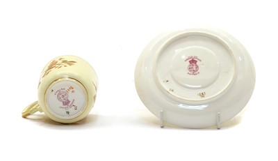 Lot 100 - A Royal Worcester porcelain cabinet cup and saucer