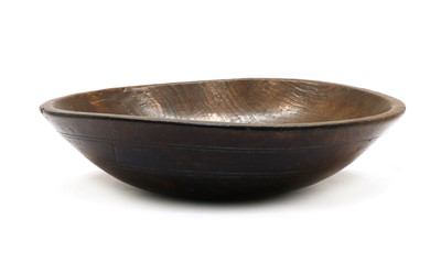 Lot 215 - A 19th century wooden dairy bowl