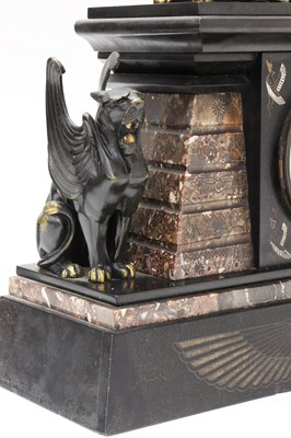 Lot 53 - An Egyptian Revival marble and slate mantel clock garniture