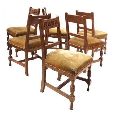 Lot 46 - A set of six oak dining chairs