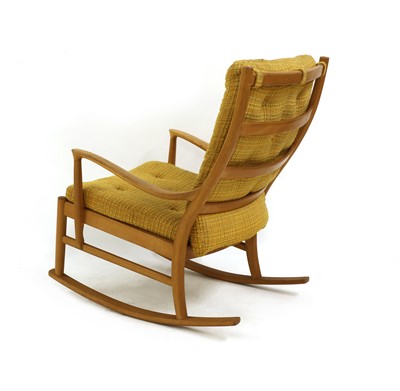Lot 480 - A Parker Knoll beechwood rocking chair