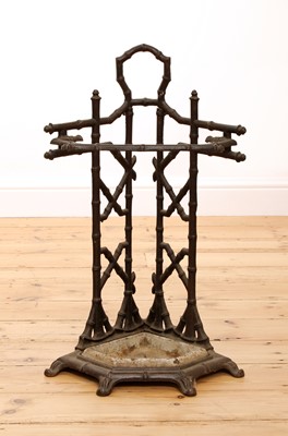 Lot 392 - A faux bois cast iron corner stick stand