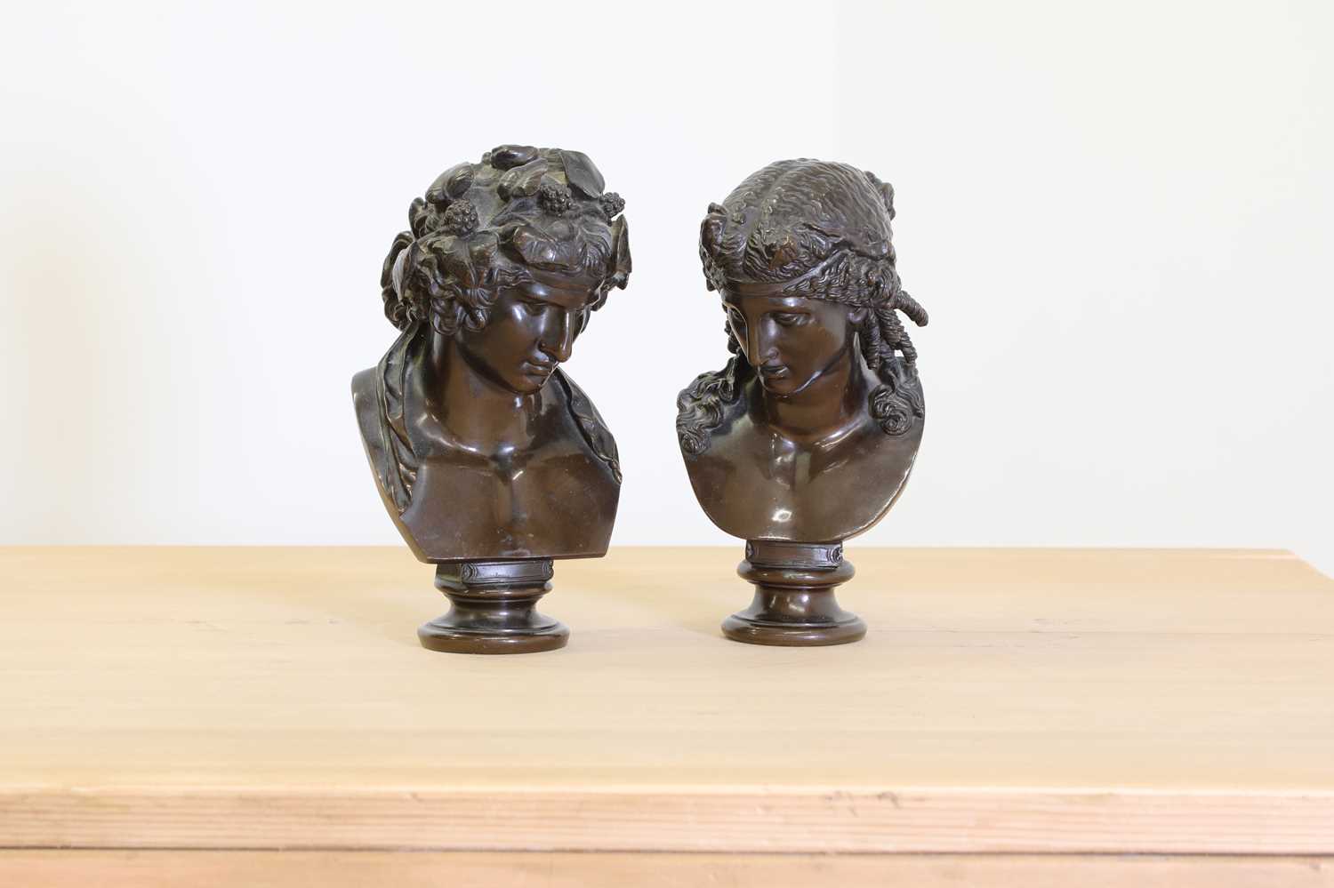 Lot 173 - A pair of grand tour bronze busts of Antinous as Dionysus and Ariadne
