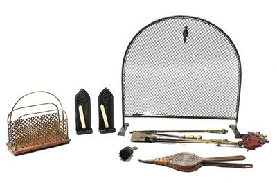Lot 439 - A set of three brass fire tools