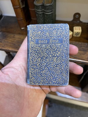 Lot 107 - A collection of miniature books, book boxes and related items