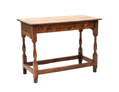 Lot 423 - An oak and fruitwood side table