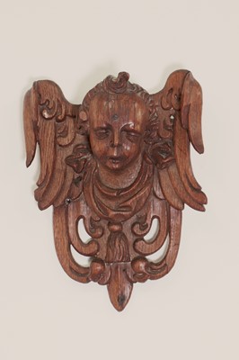 Lot 197 - A carved oak corbel