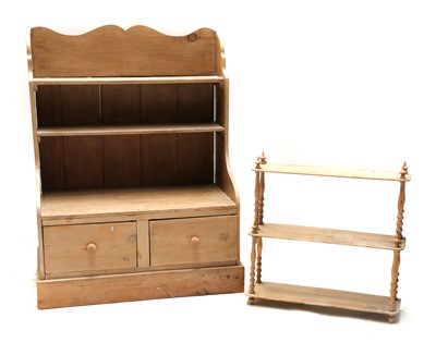 Lot 423 - A pine waterfall bookcase