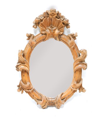 Lot 419 - A carved pine mirror