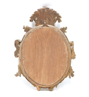 Lot 419 - A carved pine mirror