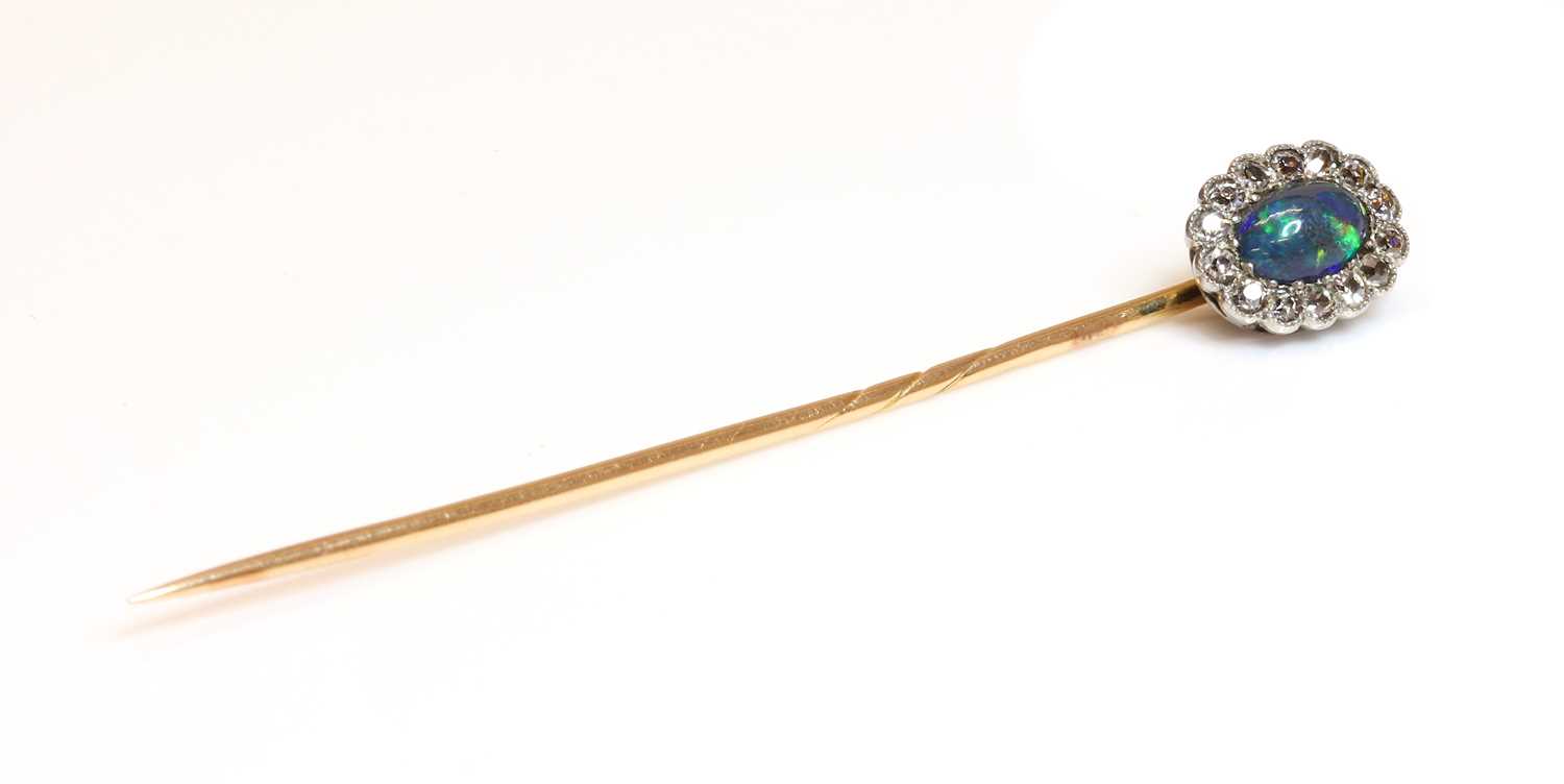 Lot 117 - A black opal and diamond stickpin, c.1915