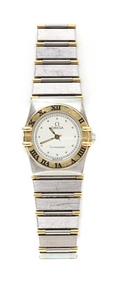 Lot 327 - A ladies' bi-colour Omega 'Constellation' quartz bracelet watch