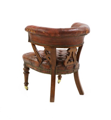 Lot 332 - A mid-Victorian buttoned leather desk chair