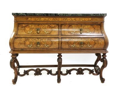 Lot 297 - A walnut and marquetry inlaid bombe commode in the 18th-century taste