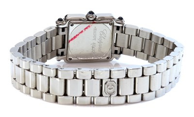 Lot 332 - A ladies' stainless steel diamond set Chopard 'Happy Sport' quartz bracelet watch, c.2005