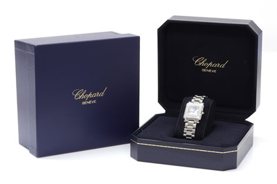 Lot 332 - A ladies' stainless steel diamond set Chopard 'Happy Sport' quartz bracelet watch, c.2005