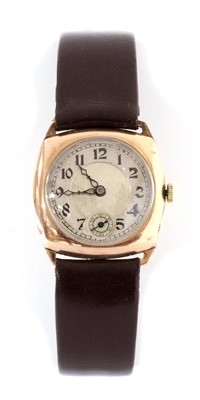 Lot 1530 - A 9ct gold cushion shaped mechanical strap watch