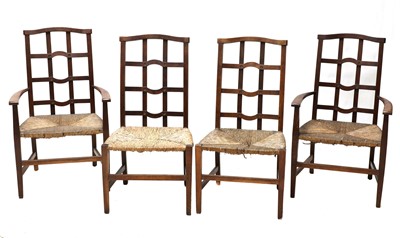 Lot 134 - A set of four Arts and Crafts oak lattice back chairs