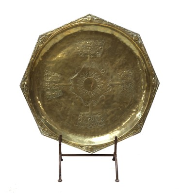 Lot 147 - An Arts and Crafts brass charger