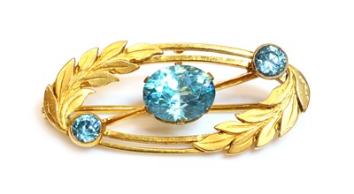 Lot 212 - A gold blue zircon oval wreath brooch, by Payton Pepper, c.1950