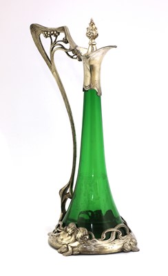 Lot 22 - An Art Nouveau WMF silver-plated and green glass claret jug and stopper