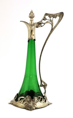 Lot 22 - An Art Nouveau WMF silver-plated and green glass claret jug and stopper