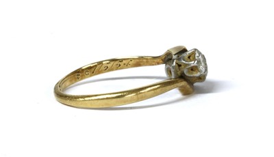 Lot 25 - A gold three stone diamond ring