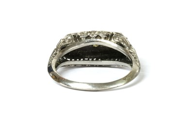 Lot 43 - An American white gold three stone diamond ring