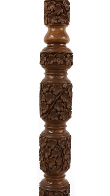 Lot 307 - A Kashmir carved hardwood standard lamp