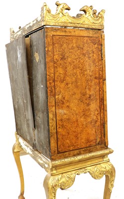 Lot 300 - A reproduction cabinet on giltwood stand
