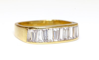 Lot 407 - A Continental diamond set half eternity ring