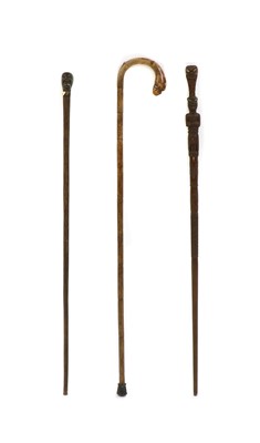Lot 234 - Three various walking sticks