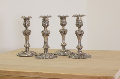 Lot 338 - A set of four George IV silver candlesticks