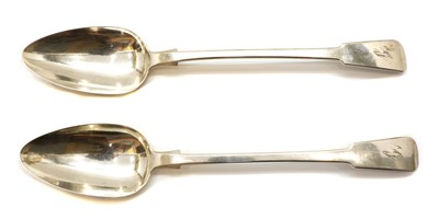 Lot 11 - A pair of George III silver fiddle pattern basting spoons