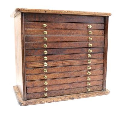 Lot 250 - A pitch pine and oak collector’s cabinet