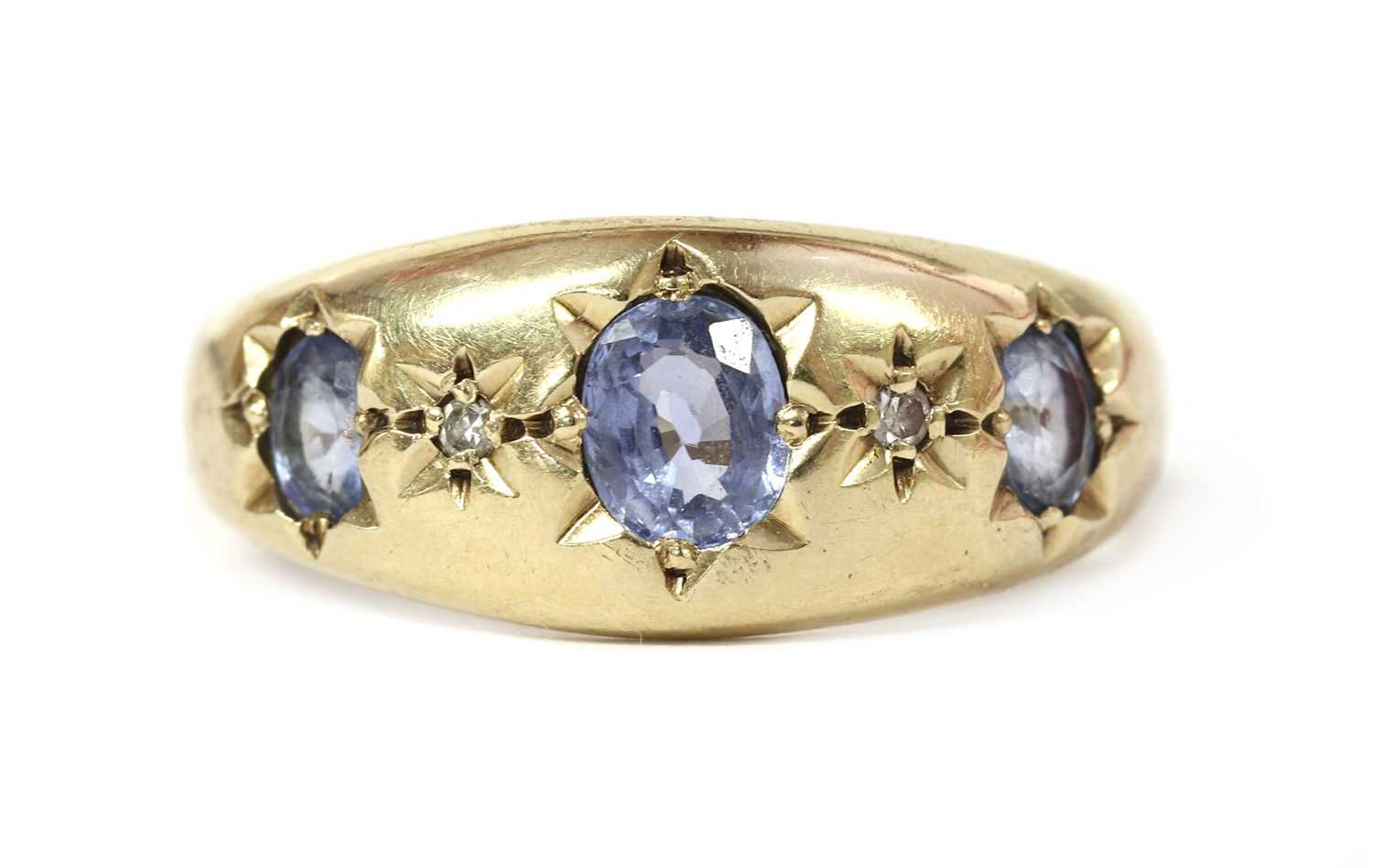 Lot 1289 - A 9ct gold sapphire and diamond ring,