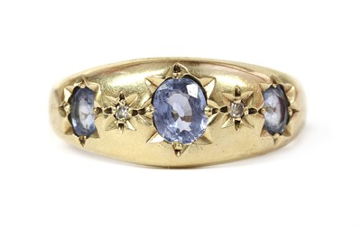 Lot 1289 - A 9ct gold sapphire and diamond ring