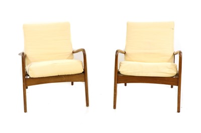 Lot 357 - A pair of teak armchairs