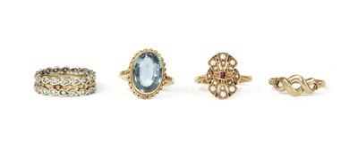 Lot 1386 - Four 9ct gold rings