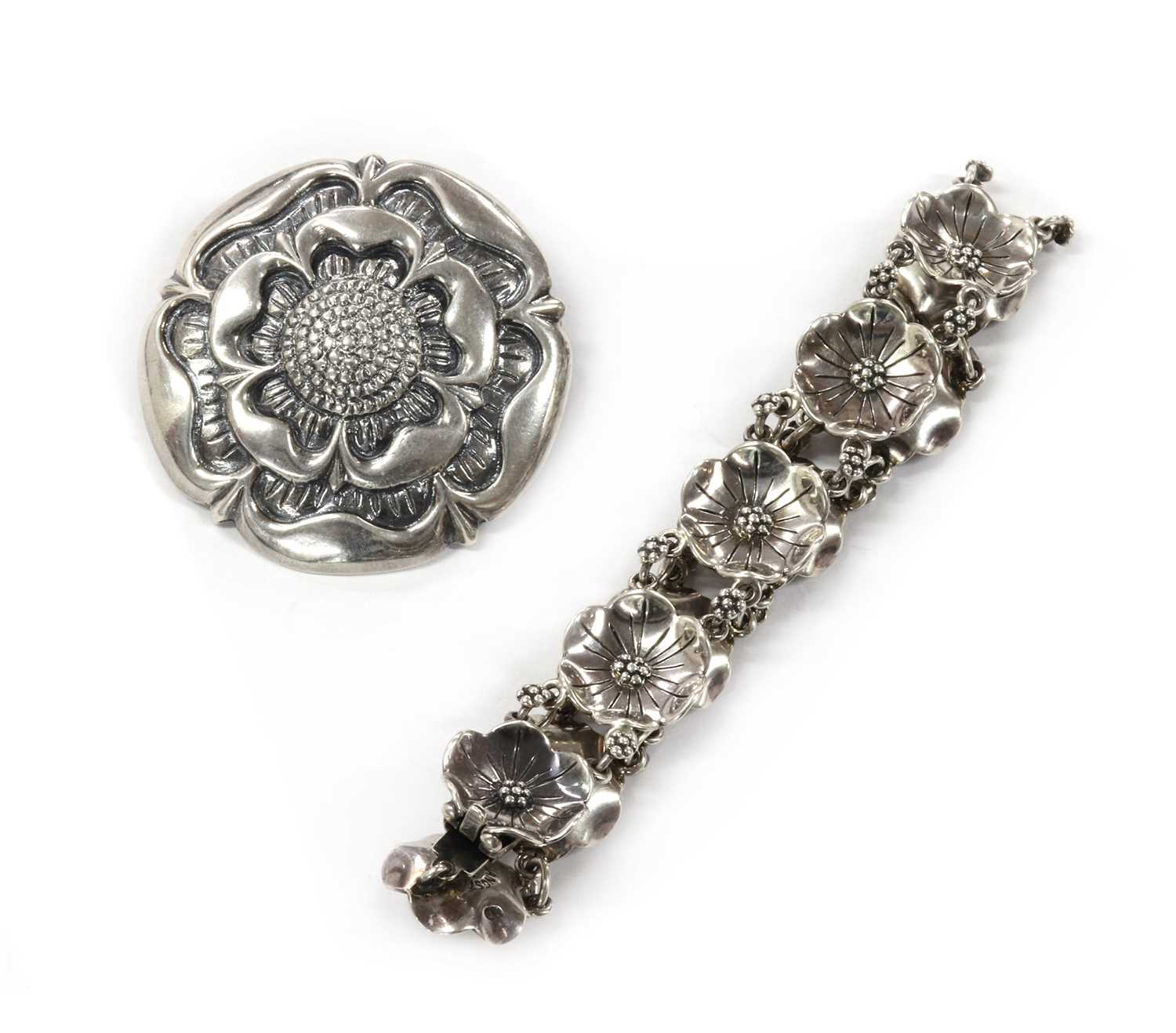 Lot 190 - A sterling silver rose brooch, by Bernard Instone