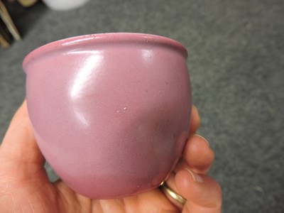 Lot 102 - A collection of four Chinese pink glazed cups