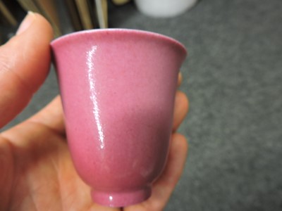 Lot 102 - A collection of four Chinese pink glazed cups