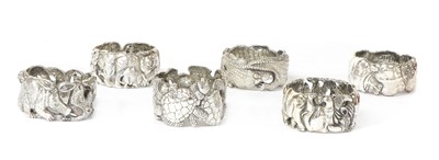 Lot 1320 - A set of six animal napkin rings, by Patrick Mavros