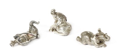Lot 1315 - A set of three silver sculptures of elephants playing, by Patrick Mavros